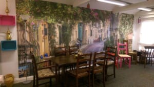 The inside of The Olive Branch restaurant in Colchester, with a view of the restaurant's tables