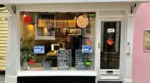 The front of 'Timbers' restaurant in Colchester, with a view of the restaurant's window display