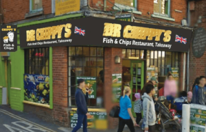 The front of 'Dr Chippy's' restaurant in Colchester, with a view of the restaurant's window display