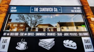 The front of 'The Sandwich Co.' restaurant in Colchester, with a view of the restaurant's window display
